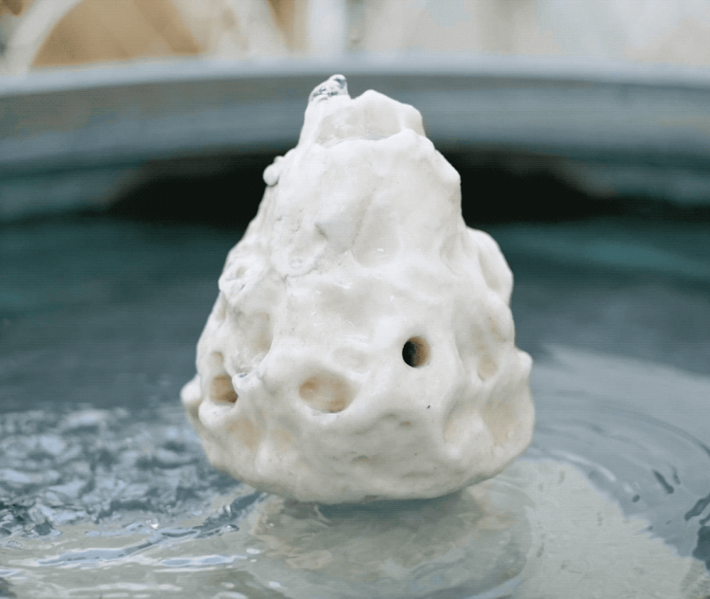 Well weathered Carrara marble fountain spout